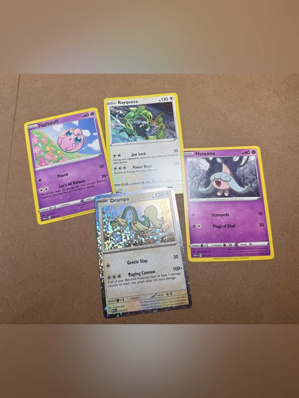 Pokemon Trading Cards Bundle Lot of 4 Drampa Jigglypuff Rayquaza Hatenna